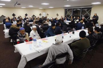 Community members and friends congratualte Helal in event at Jamia Mosque