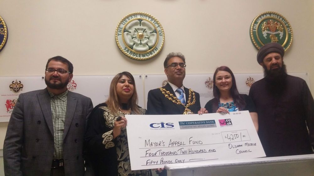 Members of Oldham Mosques Council give cheque to Mayor's Appeal
