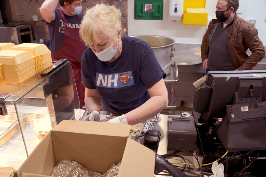 NHS Staff unpacking boxed meals